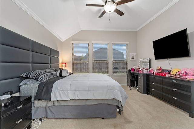 bedroom with ceiling fan, crown molding, light colored carpet, and vaulted ceiling