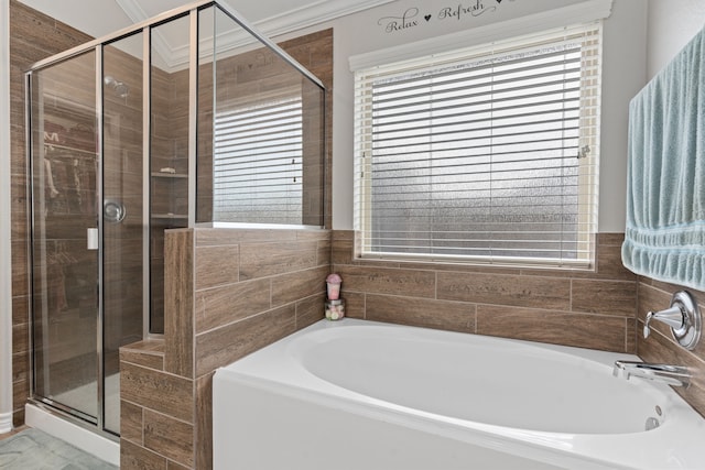 bathroom with shower with separate bathtub and crown molding