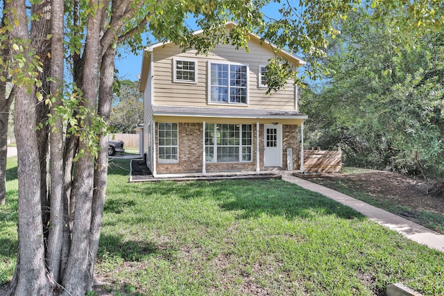 front facade with a front lawn