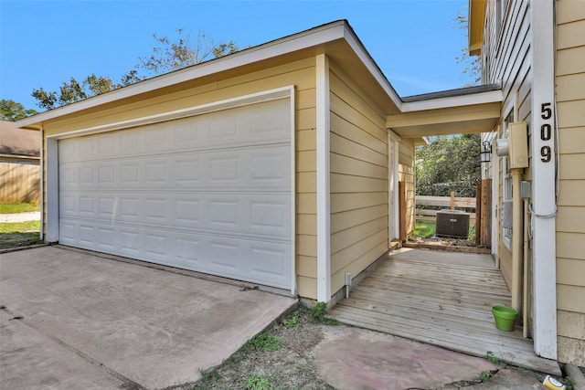 garage with central AC unit