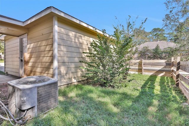 view of yard with central AC