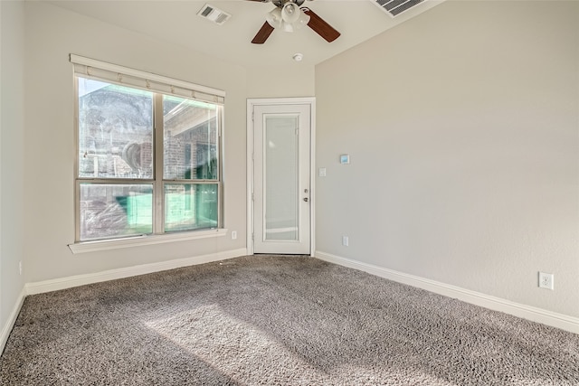 carpeted empty room with ceiling fan