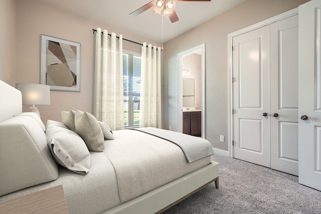 bedroom with ceiling fan, a closet, carpet floors, and ensuite bathroom