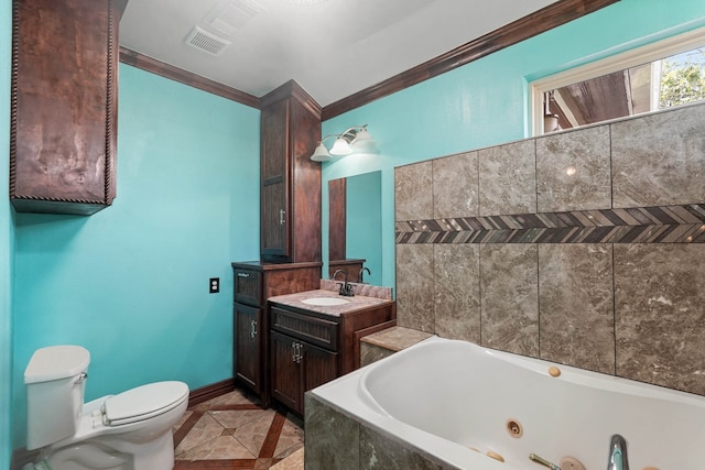 bathroom featuring tile patterned flooring, a bath, crown molding, toilet, and vanity