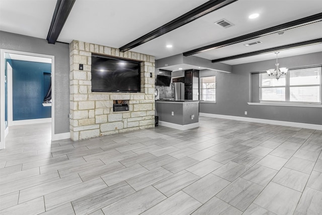 unfurnished living room featuring beamed ceiling and a notable chandelier