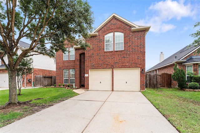 front facade featuring a garage and a front yard