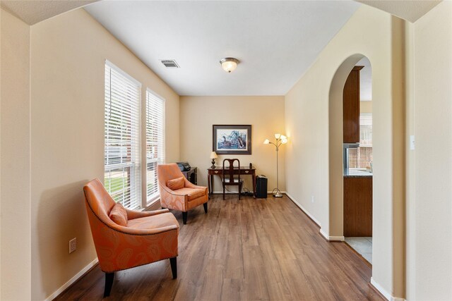 living area with wood-type flooring