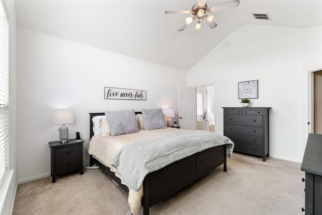 bedroom featuring light colored carpet, visible vents, a ceiling fan, high vaulted ceiling, and baseboards