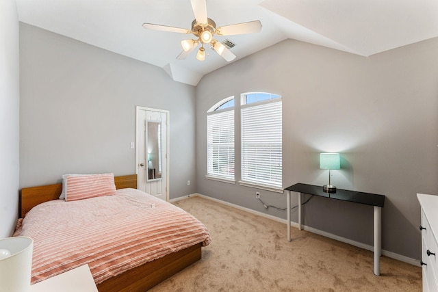 bedroom with lofted ceiling, ceiling fan, carpet flooring, visible vents, and baseboards