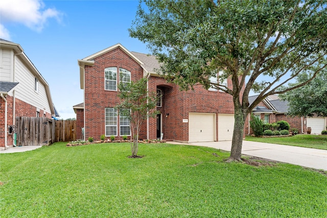 traditional home featuring driveway, fence, a front lawn, and brick siding