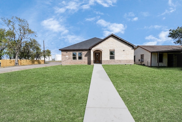 view of front of home featuring a front lawn