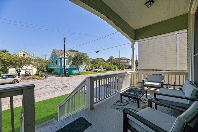 wooden terrace with a porch