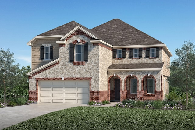 view of front of house featuring a front lawn and a garage