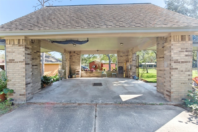 view of parking / parking lot featuring a carport