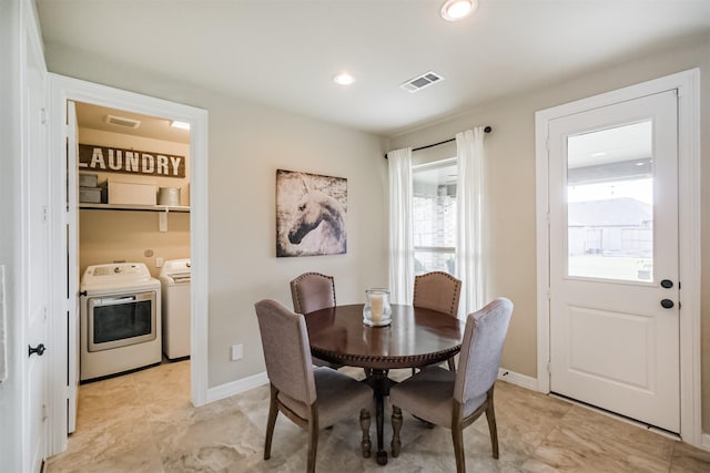 dining space featuring washer and dryer