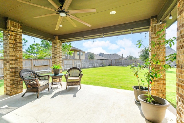 view of patio / terrace featuring ceiling fan