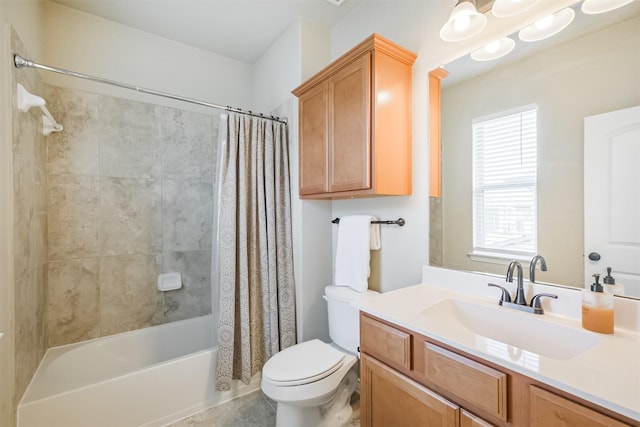 full bathroom featuring vanity, toilet, and shower / tub combo