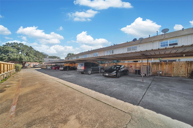 view of vehicle parking featuring a carport