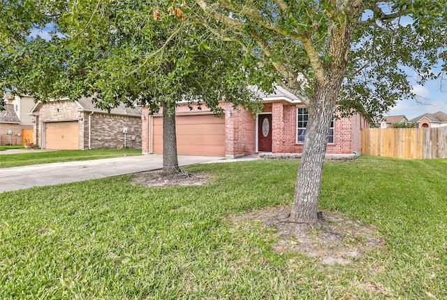 obstructed view of property featuring a front yard and a garage