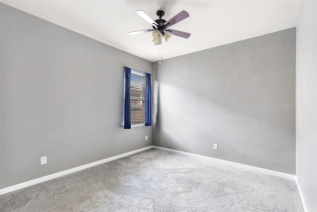 unfurnished room featuring carpet floors and ceiling fan