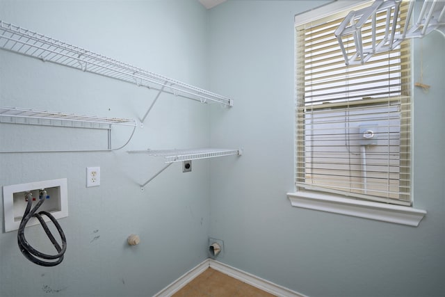 clothes washing area featuring washer hookup and hookup for an electric dryer