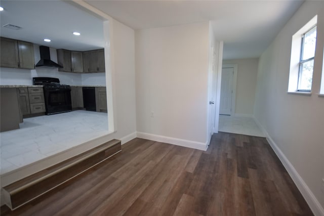 314 Reese Rd, Crosby, TX 77532 - unfurnished dining area featuring wood finished floors, baseboards, and recessed lighting