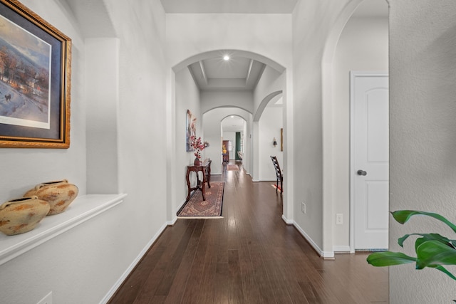 corridor with dark wood-type flooring