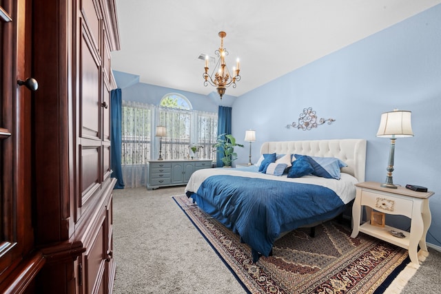 carpeted bedroom with a notable chandelier