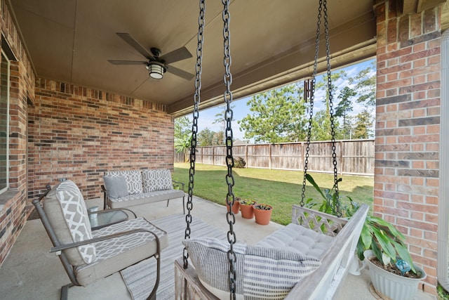 view of patio with ceiling fan and an outdoor hangout area