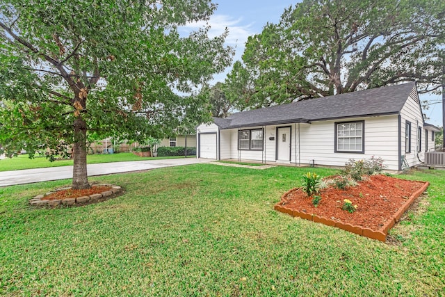 ranch-style home featuring central air condition unit, a front yard, and a garage