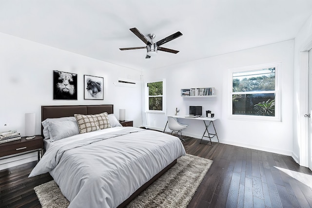 bedroom featuring ceiling fan and dark hardwood / wood-style flooring