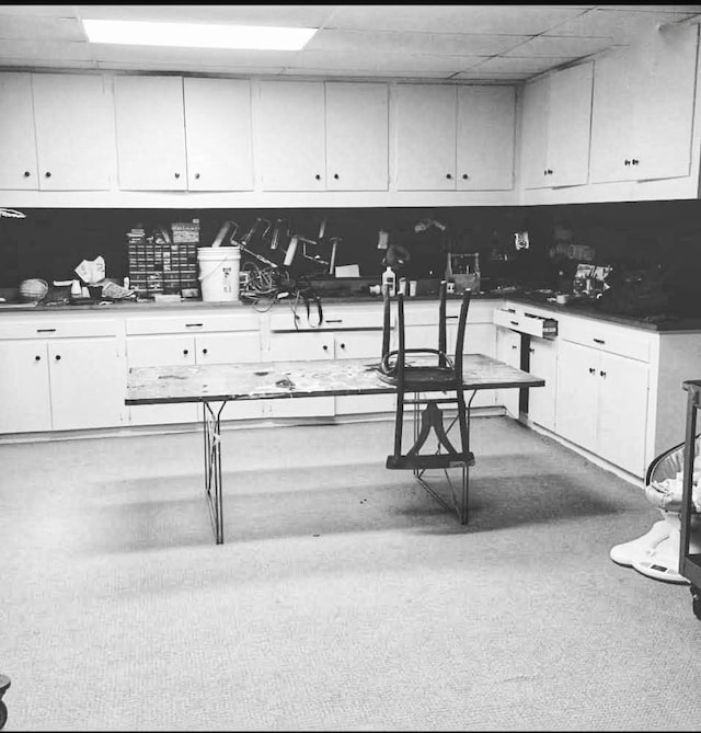 kitchen featuring white cabinetry