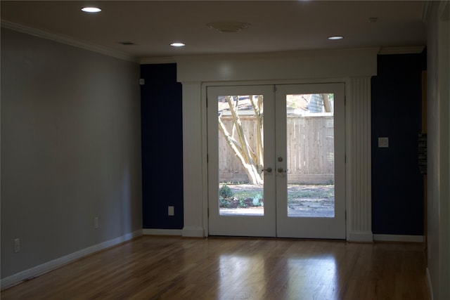 doorway featuring a wealth of natural light, french doors, and hardwood / wood-style floors