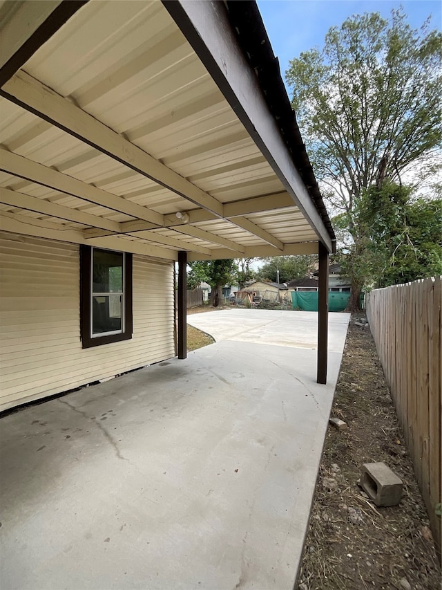 view of patio / terrace with a carport