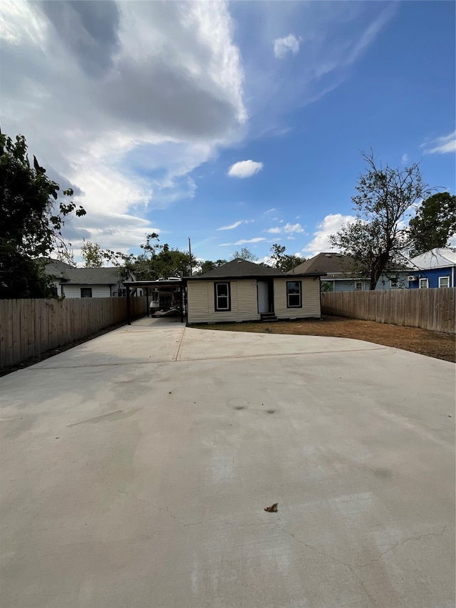 view of front facade with a carport