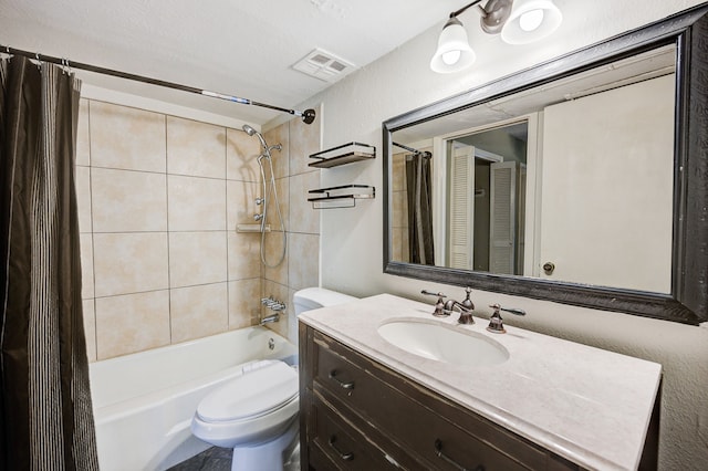 full bathroom featuring vanity, shower / bath combination with curtain, a textured ceiling, and toilet