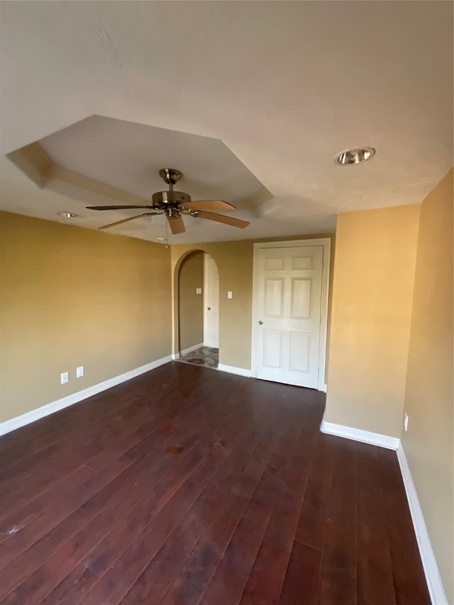 empty room featuring dark hardwood / wood-style flooring