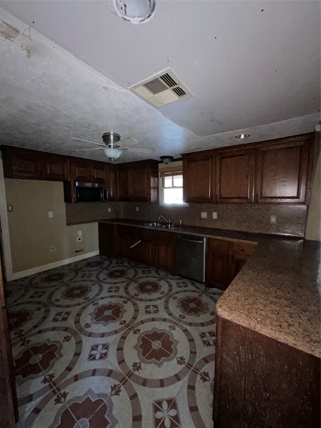 kitchen featuring ceiling fan, sink, dark brown cabinetry, and stainless steel appliances