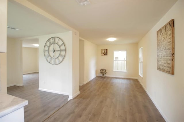 hallway featuring hardwood / wood-style flooring