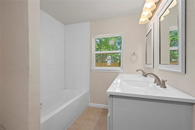 bathroom with tile patterned floors and vanity