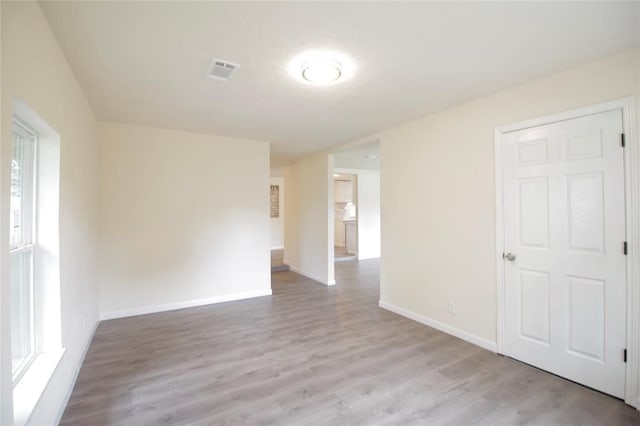 empty room featuring light hardwood / wood-style floors