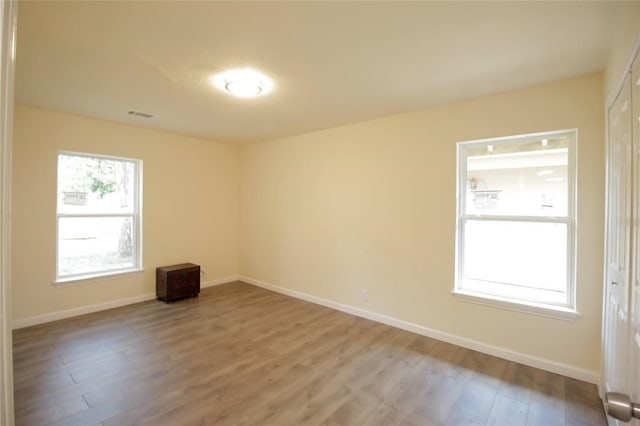 empty room featuring hardwood / wood-style floors