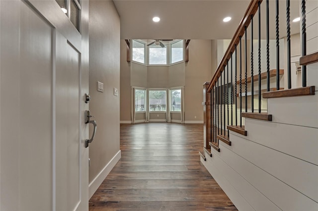 entryway with recessed lighting, baseboards, a ceiling fan, and dark wood-style flooring