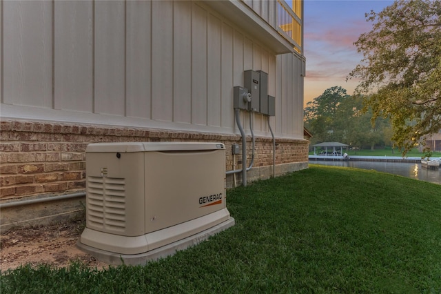 exterior details with brick siding, board and batten siding, and a power unit