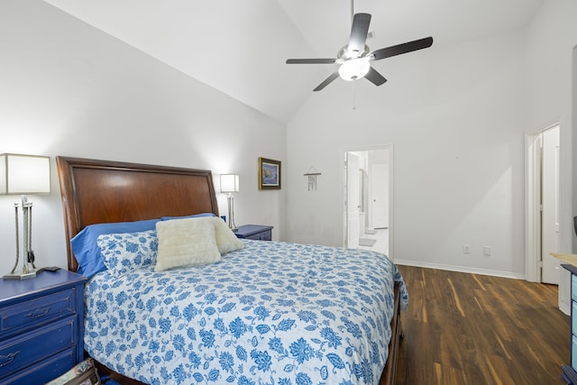 bedroom with ceiling fan, dark wood-type flooring, high vaulted ceiling, and connected bathroom