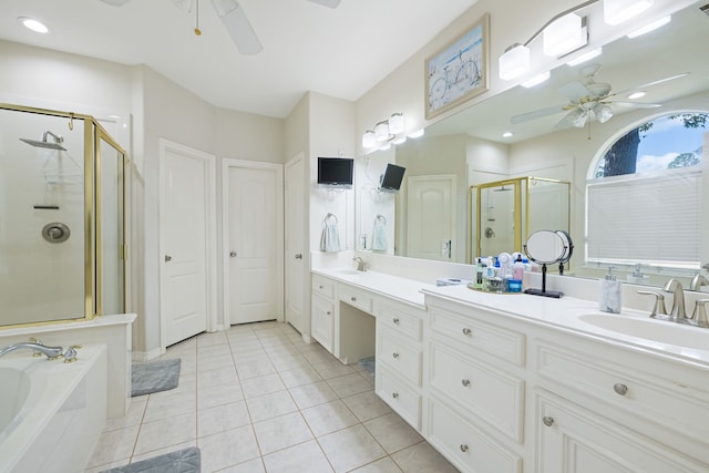 bathroom featuring tile patterned floors, ceiling fan, vanity, and independent shower and bath