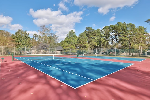 view of sport court featuring basketball hoop