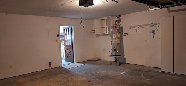 garage with water heater and a garage door opener