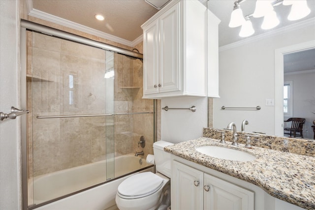 full bathroom with vanity, toilet, ornamental molding, and bath / shower combo with glass door