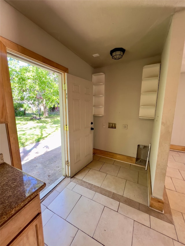 interior space featuring light tile patterned flooring